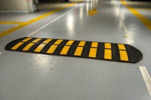 A speed bump installed in under parking lot in vanocuver